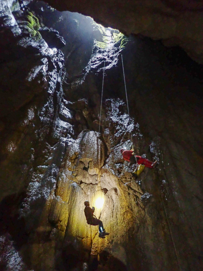 team in cave