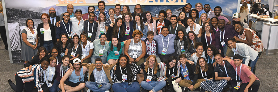 A large group of students pose for a group photo.